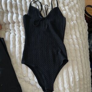 Black sleeveless, solid net, embossed, body suit, size small